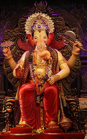 Ganesha Statue in Red Robes with Golden Crown and Axe HD phone wallpaper