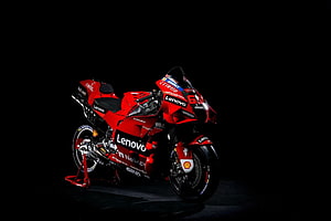 Ducati Lenovo MotoGP 2022 Racing Motorcycle on Black Background HD wallpaper