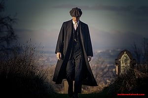 Peaky Blinders Tommy Shelby Walking Through a Misty Cemetery at Dusk HD wallpaper