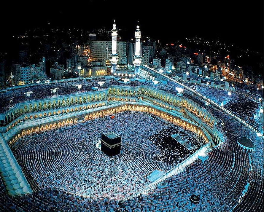 Aerial Night View of Kaaba in Mecca with Crowds Performing Tawaf HD wallpaper