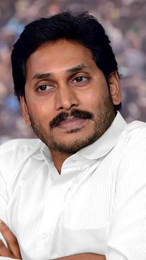 Portrait of YS Jagan in a white shirt with a confident expression HD phone wallpaper