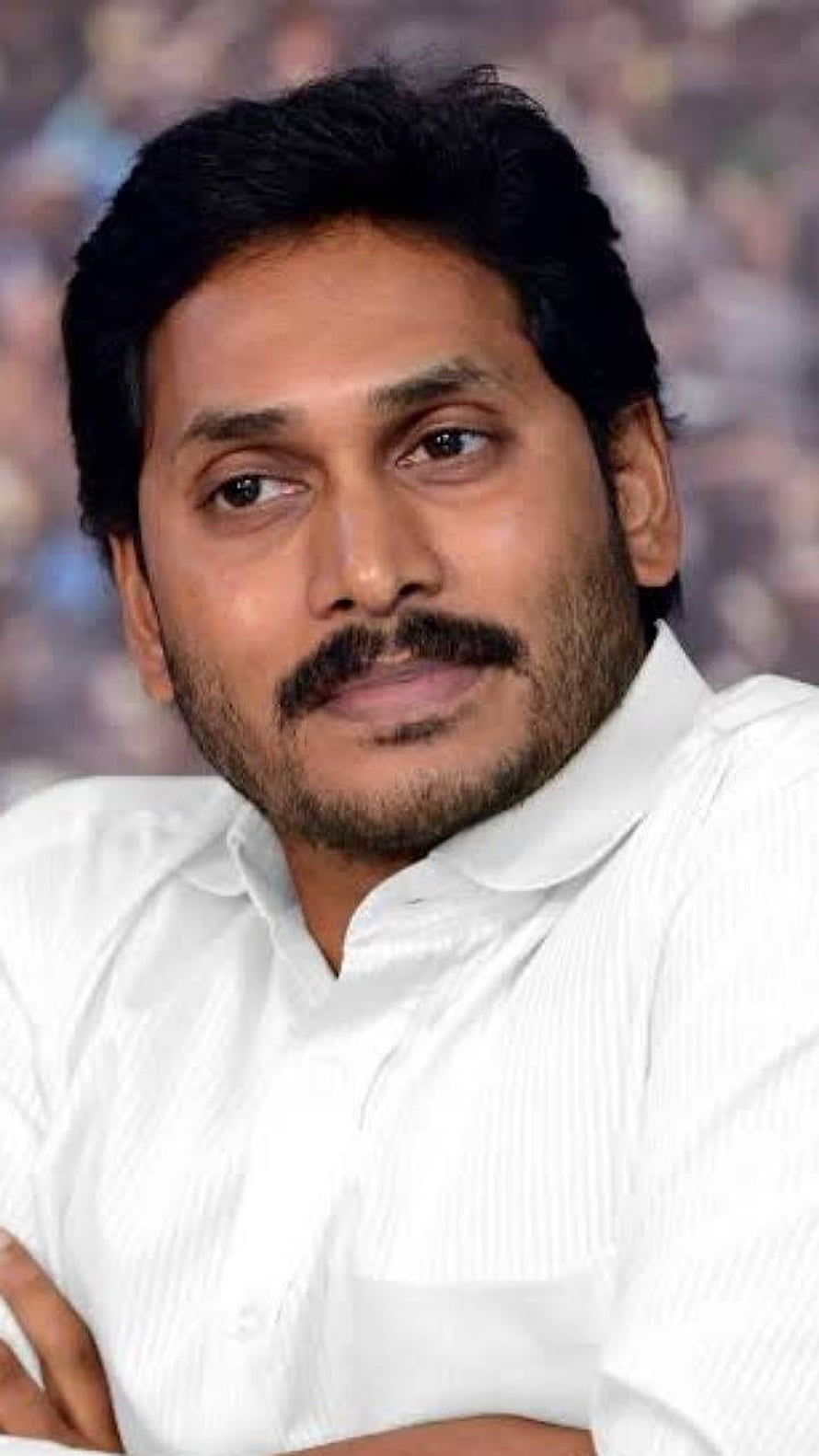 Portrait of YS Jagan in a white shirt with a confident expression HD phone wallpaper