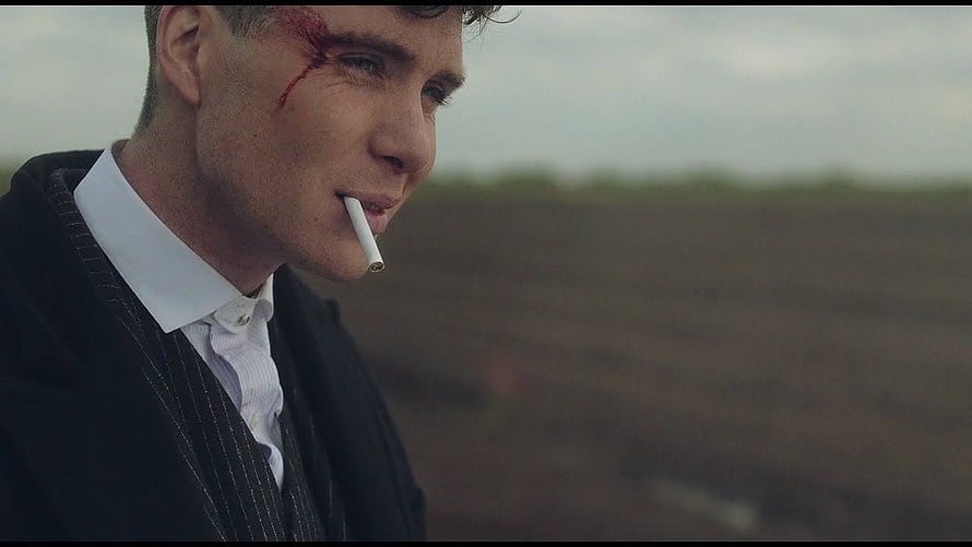 Thomas Shelby Smoking Cigarette in Pinstripe Suit with Bloodied Face HD wallpaper