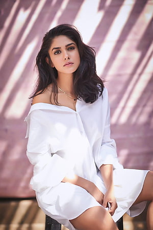 Mrunal Thakur in a White Off-Shoulder Shirt Dress with Soft Window Light HD phone wallpaper