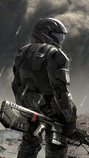 Halo Master Chief in Dark Tactical Armor Holding Rifle in Rainy Battlefield HD phone wallpaper