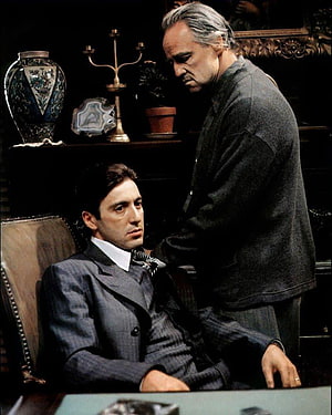 Michael Corleone and Vito Corleone in a tense office scene from The Godfather HD phone wallpaper