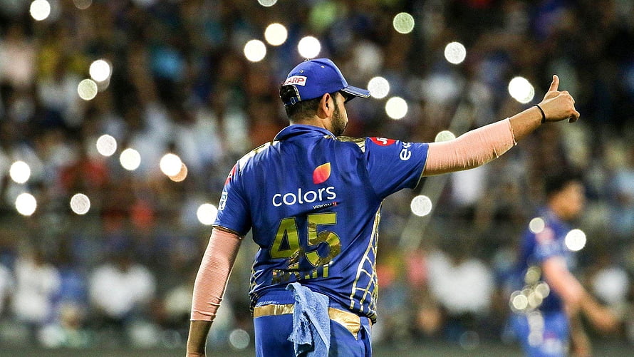 Rohit Sharma in Mumbai Indians Jersey Pointing at Crowd During Cricket Match HD wallpaper