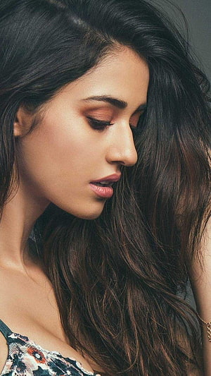 Disha Patani Profile Portrait With Long Dark Hair And Floral Top HD phone wallpaper