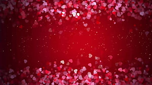 Romantic Red Heart Bokeh Background with Soft Glowing Particles and Deep Crimson Gradient HD wallpaper