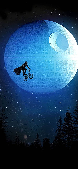 Darth Vader Riding a Bicycle in Front of the Death Star Under a Starry Night Sky HD phone wallpaper