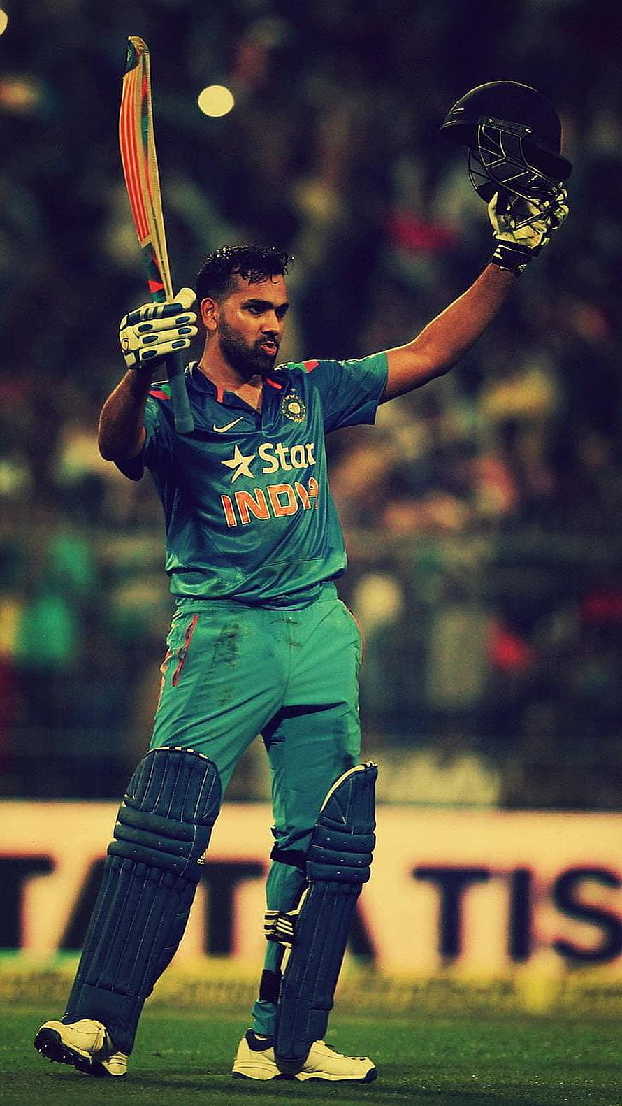 Rohit Sharma Celebrating with Bat and Helmet in India Cricket Jersey HD phone wallpaper