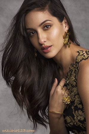 Nora Fatehi in Black and Gold Embroidered Dress with Statement Jewelry HD phone wallpaper