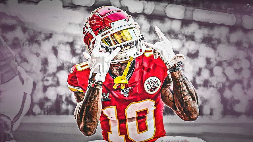 Tyreek Hill in Kansas City Chiefs Red Jersey Making Hand Gesture on the Field HD wallpaper