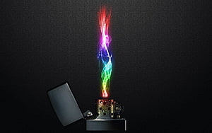 Metal lighter with vibrant rainbow flame against dark textured background HD wallpaper