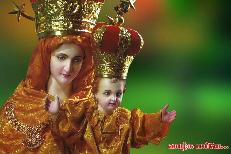 Velankanni Mary Statue with Child Jesus in Golden Attire and Crowns HD wallpaper
