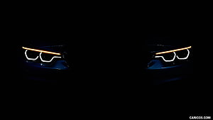 BMW Adaptive LED Headlights with Amber Turn Signals in Dark Setting HD wallpaper