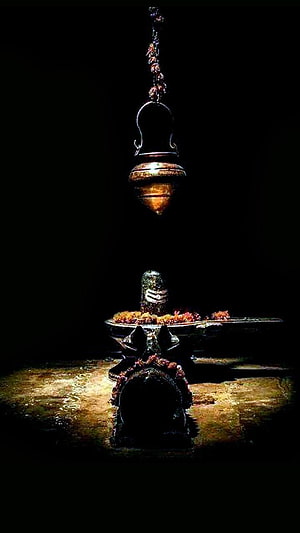Shiva Lingam with Sacred Rudraksha Mala and Hanging Brass Lamp HD phone wallpaper
