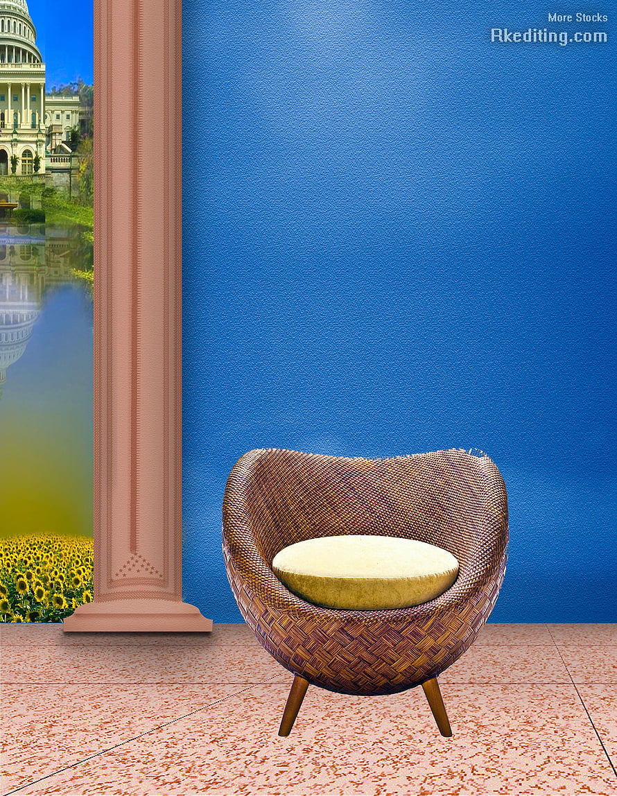 Woven rattan chair with cushion against blue wall and sunflower field view HD phone wallpaper