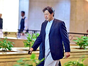 Imran Khan Walking in Formal Attitude Wearing Blue Blazer and Traditional Shalwar Kameez HD wallpaper