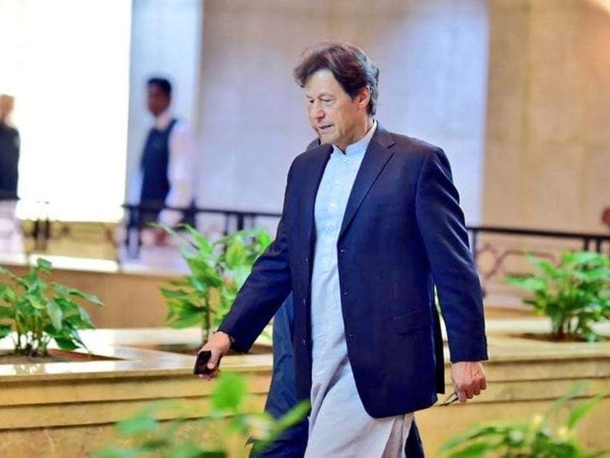 Imran Khan Walking in Formal Attitude Wearing Blue Blazer and Traditional Shalwar Kameez HD wallpaper