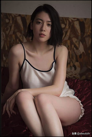 Sanji Ayaka in White Silk Slip Dress with Black Trim Sitting on Red Velvet Bed HD phone wallpaper
