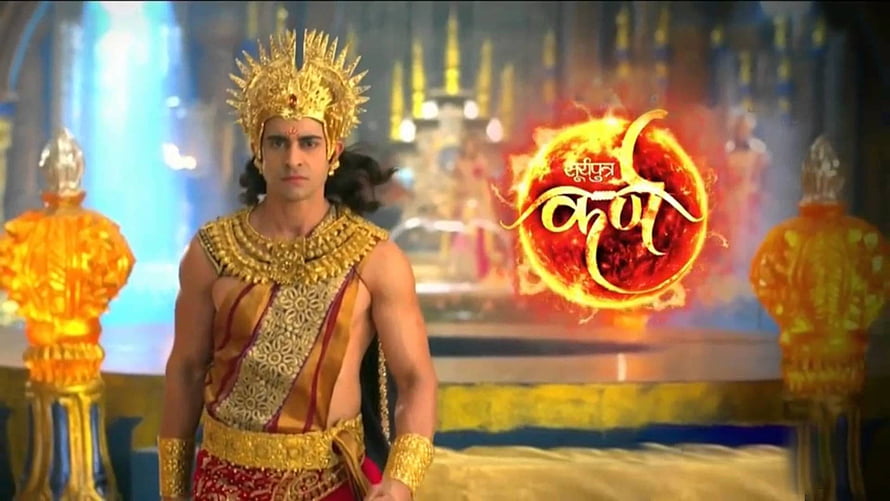Suryaputra Karn Character in Golden Royal Attire with Mythological Backdrop HD wallpaper