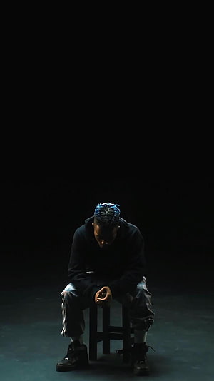 XXXTentacion Sitting Alone in Dark Studio with Blue Hair HD phone wallpaper