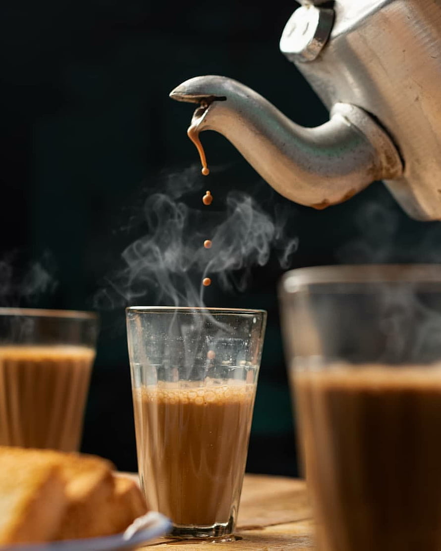 Vintage Metal Teapot Pouring Hot Steaming Tea into Glass Cups on Wooden Table HD phone wallpaper