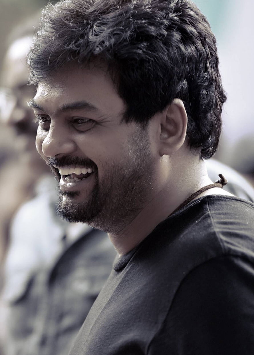 Portrait of a smiling man with dark hair and beard wearing a black t-shirt, Puri Jagannadh, puri jagannath director HD phone wallpaper