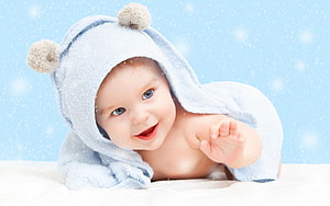 Smiling Baby Boy in Blue Bear Hooded Towel with Snowy Background HD wallpaper