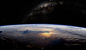 Earth Horizon From Space With Milky Way Galaxy And Sunrise Over Clouds HD wallpaper