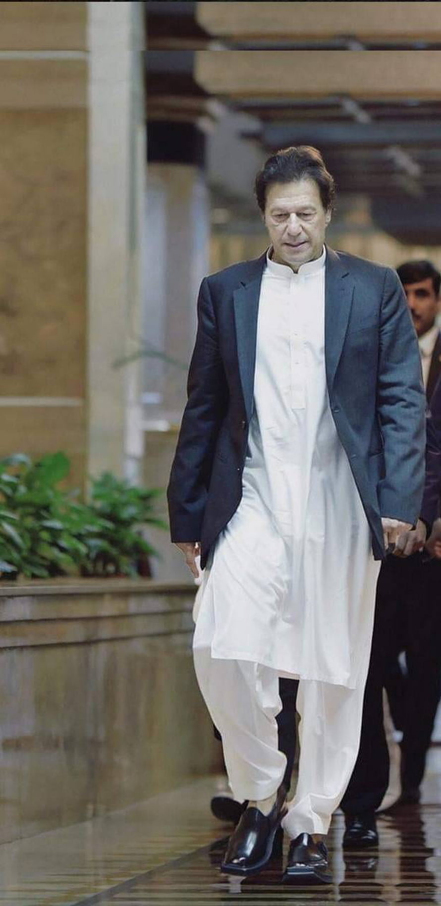 Imran Khan Walking in Traditional White Shalwar Kameez and Dark Blazer HD phone wallpaper