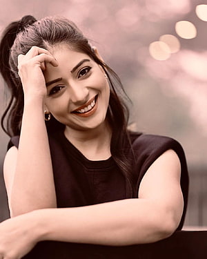 Tania Punjabi Actress Portrait With Warm Smile And Soft Bokeh Background HD phone wallpaper
