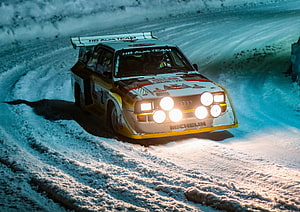 Audi Sport Quattro S1 Rally Car Racing on Snowy Mountain Road HD wallpaper