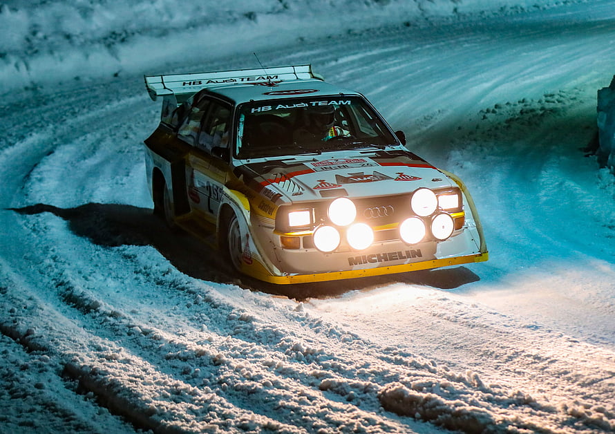 Audi Sport Quattro S1 Rally Car Racing on Snowy Mountain Road HD wallpaper
