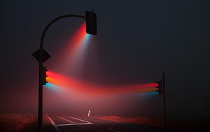 Misty Road with Glowing Traffic Lights in Fog HD wallpaper