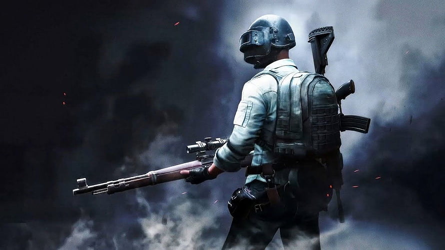 Soldier with rifle and backpack in smoky battlefield scene HD wallpaper