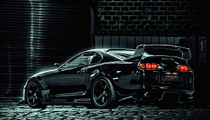 Black Toyota Supra JZA80 with Widebody Kit and Spoiler in Dark Garage HD wallpaper