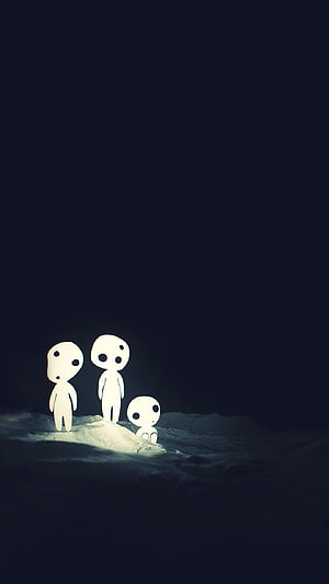 Three Minimalist White Figures Standing on a Moonlit Rocky Landscape in a Dark Night Scene HD phone wallpaper