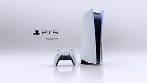 PlayStation 5 Console and DualSense Controller on a Clean White Background HD wallpaper