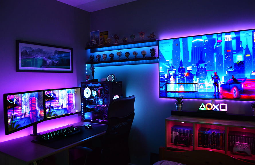 Neon Cyberpunk Gaming Setup with Dual Monitors and RGB Lighting HD wallpaper
