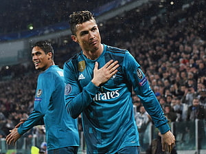 Cristiano Ronaldo in Real Madrid Away Kit During UEFA Champions League Match HD wallpaper