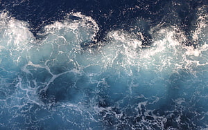 Aerial View of Ocean Waves and White Sea Foam on Deep Blue Water HD wallpaper