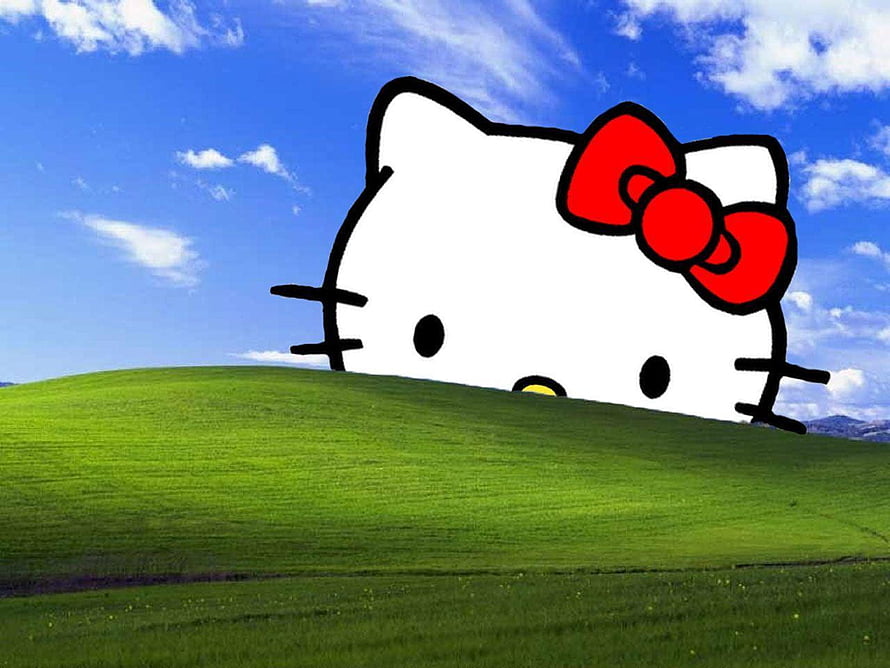 Hello Kitty Peeking Over a Green Hill Under a Blue Sky HD wallpaper