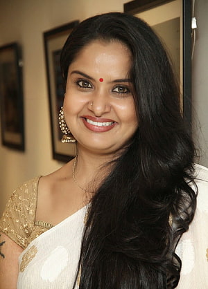Pragathi in White Saree with Gold Blouse and Traditional Jewelry HD phone wallpaper
