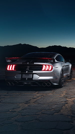 Rear View of Ford Mustang Shelby GT500 Ultra with Black Racing Stripes at Dusk HD phone wallpaper