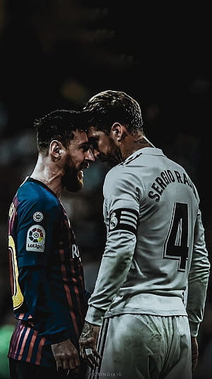 Lionel Messi and Sergio Ramos forehead touch during El Clasico football match HD phone wallpaper