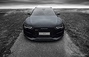 Black Audi RS 6 Avant Wagon Front View on Gravel Road HD wallpaper