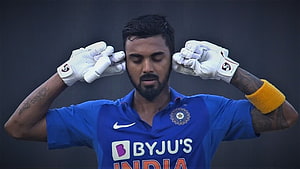 KL Rahul in India Cricket Jersey with Batting Gloves and Headphones HD wallpaper