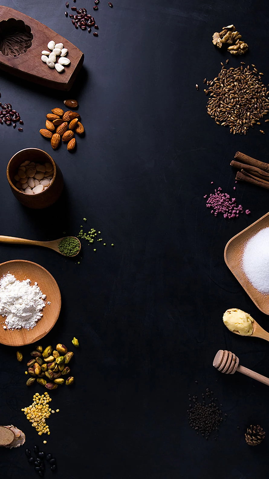 Flat lay of healthy superfoods, nuts, seeds, and spices arranged on a dark background with copy space HD phone wallpaper